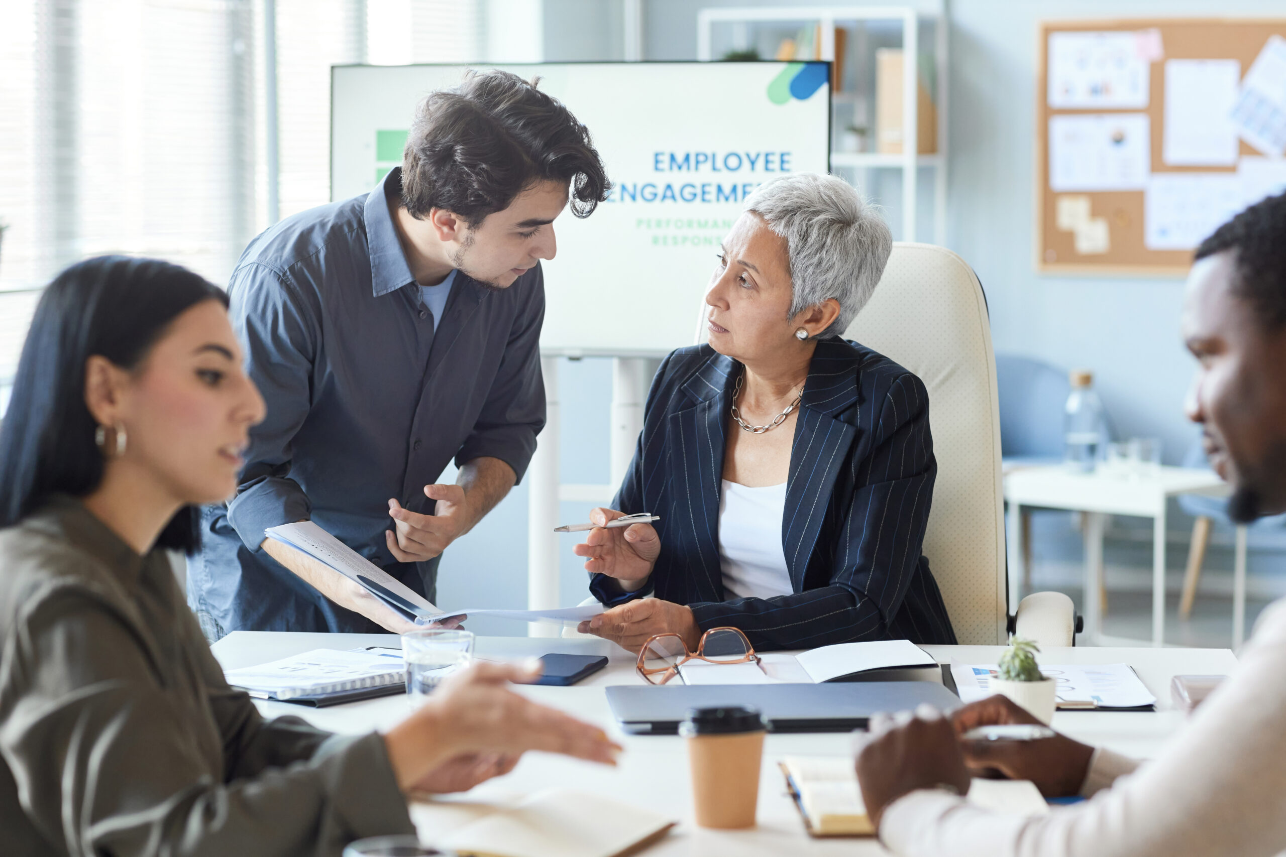 A new hire assisting a senior manager